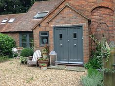 downpipe against red brick
